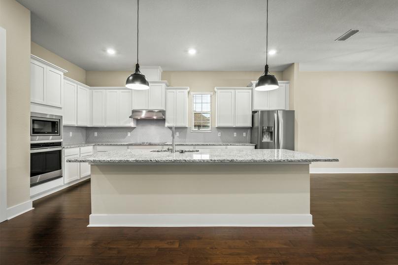 Chef-ready kitchen with granite countertops.
