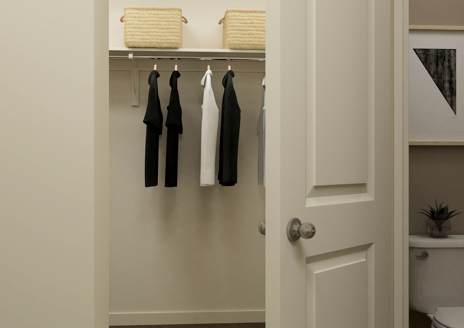 Rendering of a maser bathroom showing a  toilet next to the clostet.