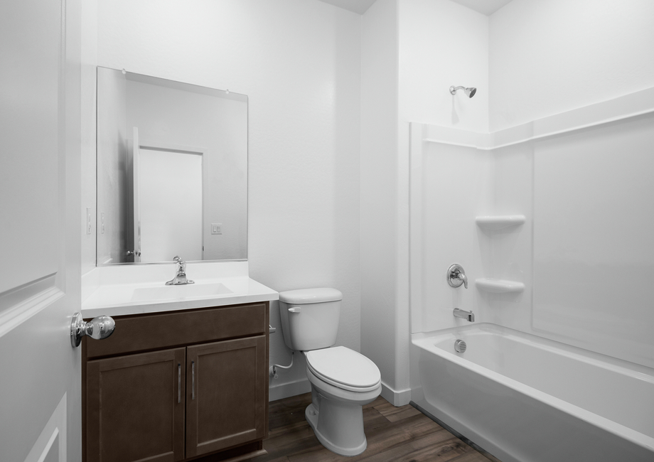 Guest bathrooms provide plenty of room and counter space for getting ready.