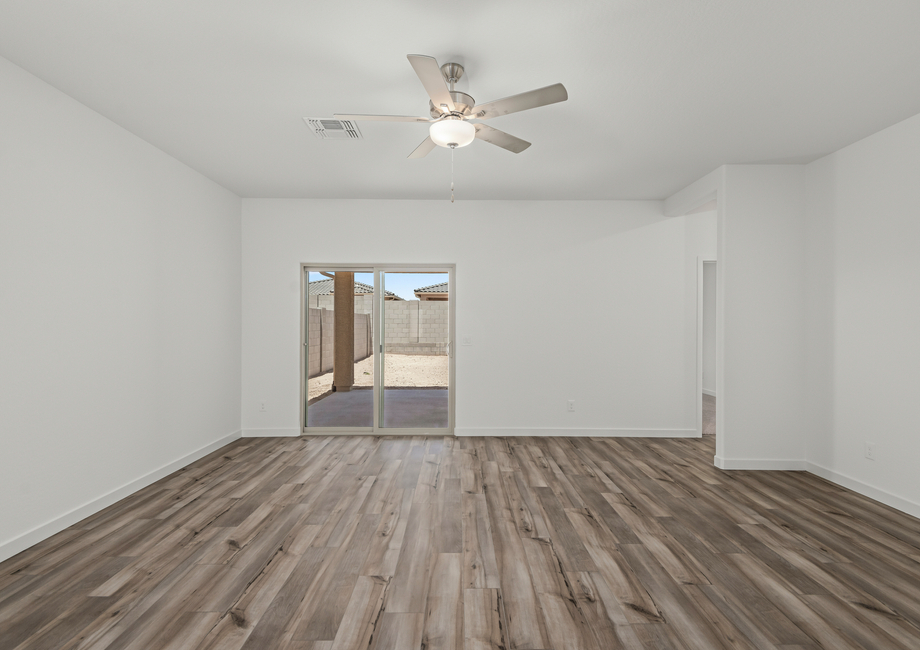Sliding glass doors lead you to your private covered patio.