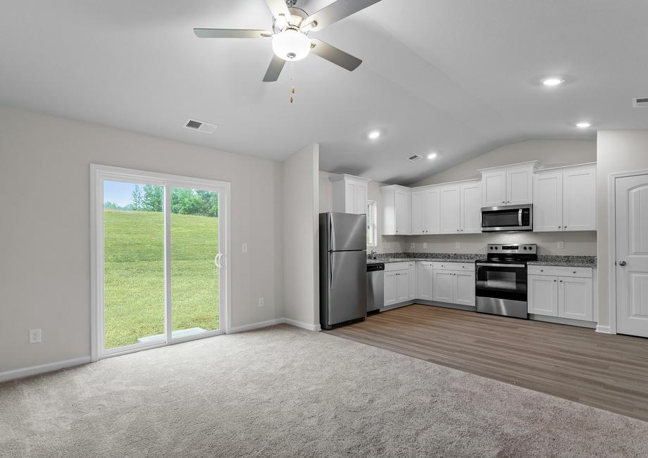 View of the kitchen and living room.