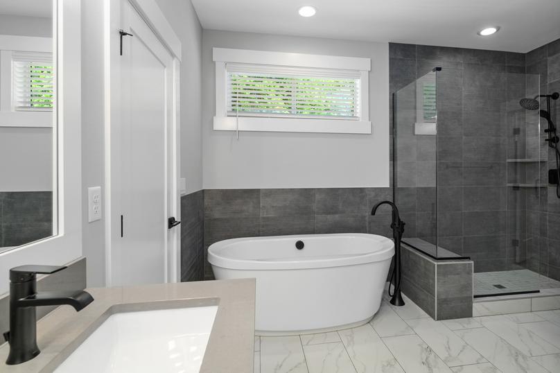In the master bathroom you have a standalone tub and an impressive walk-in shower.
