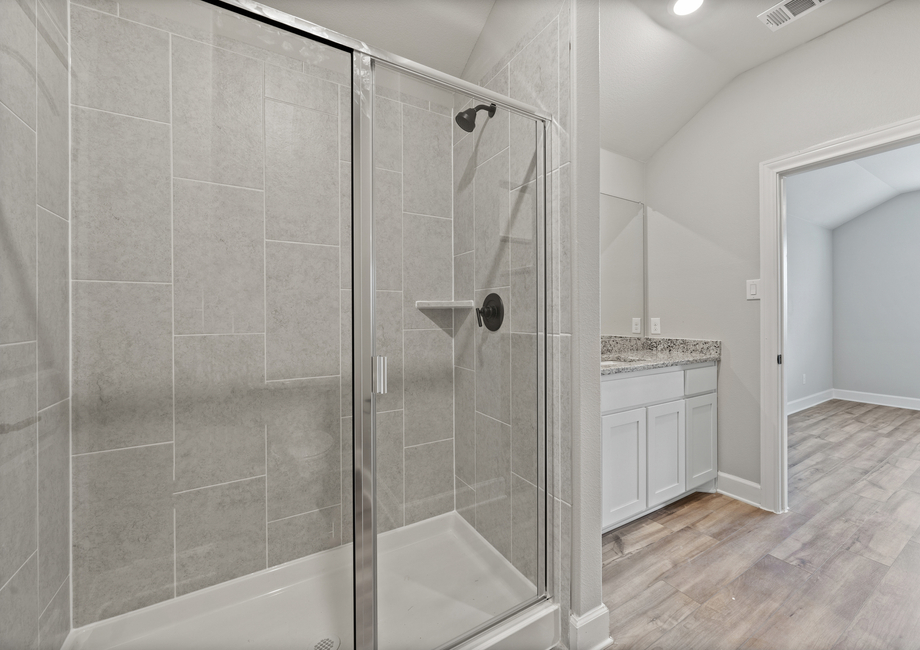 The master bathroom of the St. Clair has a walk-in, glass shower.