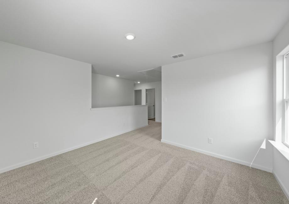 The upstairs loft is the perfect space for a gameroom.