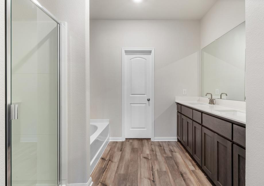 The master bathroom of the Cypress provides homeowners with a space for privacy at relaxation.