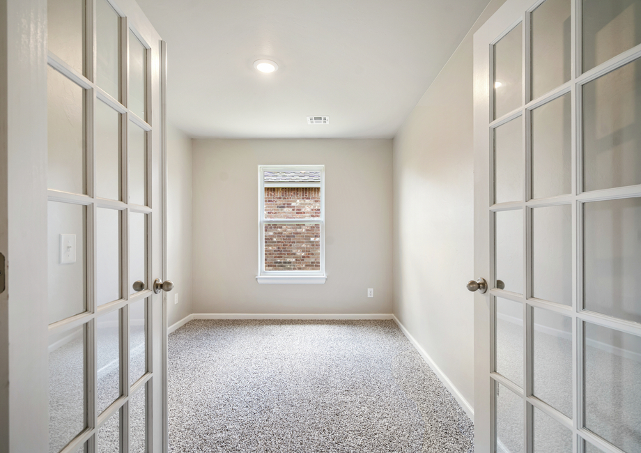 This floor plan features a study perfect for a home office or kid playroom!