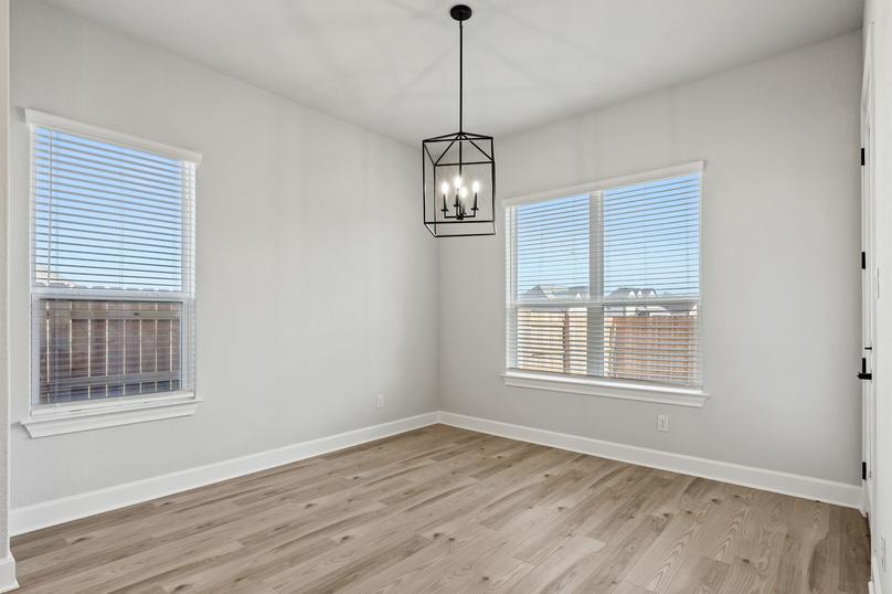 Off the kitchen is a cozy dining nook.