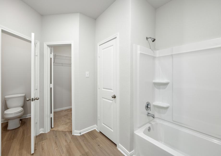 The master bathroom has a tub/shower combo and private bathroom.