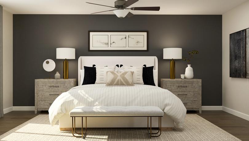 Rendering of master bedroom furnished with a large bed in between two side tables. This room also has a decorative bench at the end of the bed. 