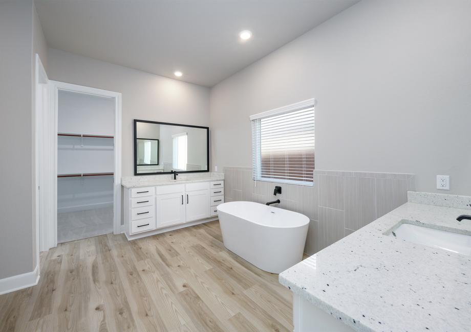 The bathroom have tons of space to get ready with two separate vanities.