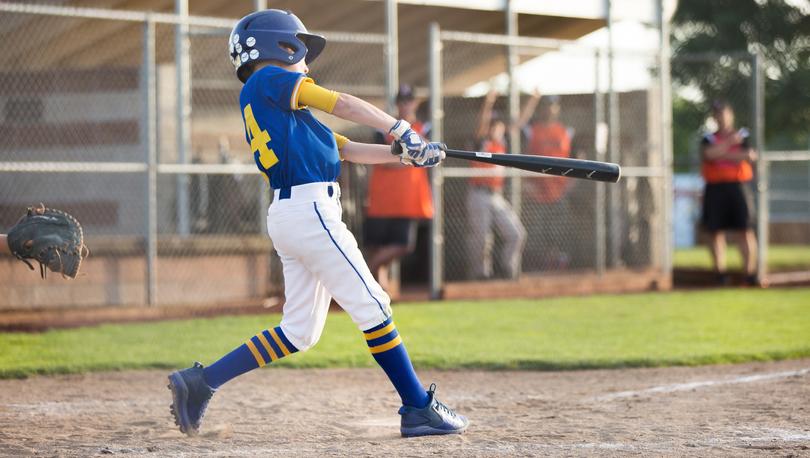 Boy playing baseball