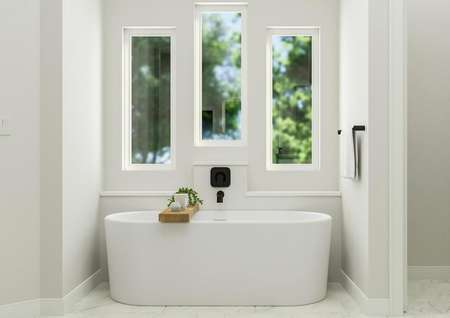 Rendering of the owner's bathroom
  showcasing the large soaking tub along a bay of windows.