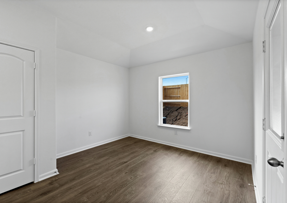 The dining room has a window that lets in tons of natural light