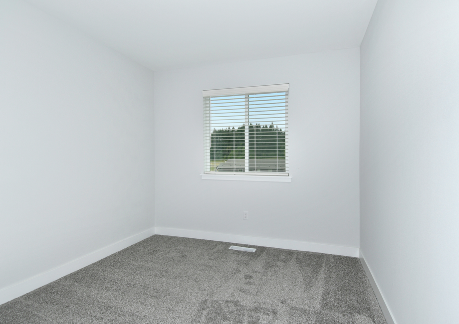 The secondary bedroom has carpet.