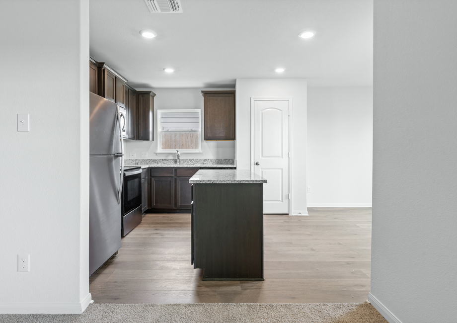 The kitchen of the Sabine sits in between the dining room and family room.