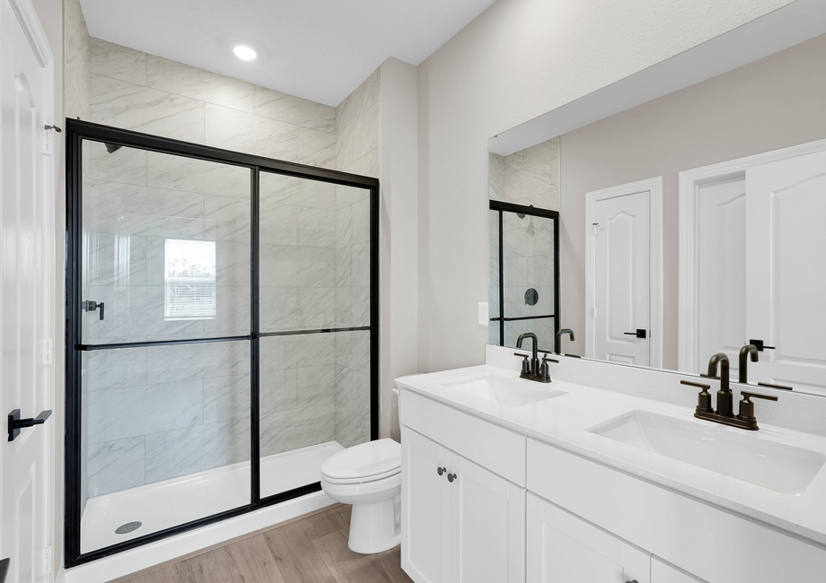 Get ready for your day in this gorgeous master bathroom