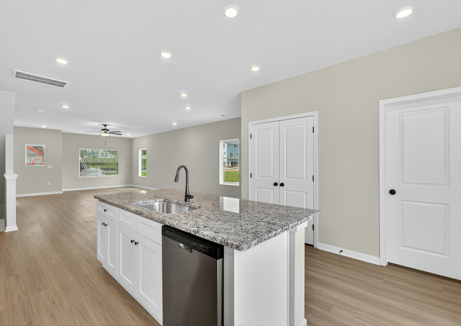 The dining area is off of the kitchen. 