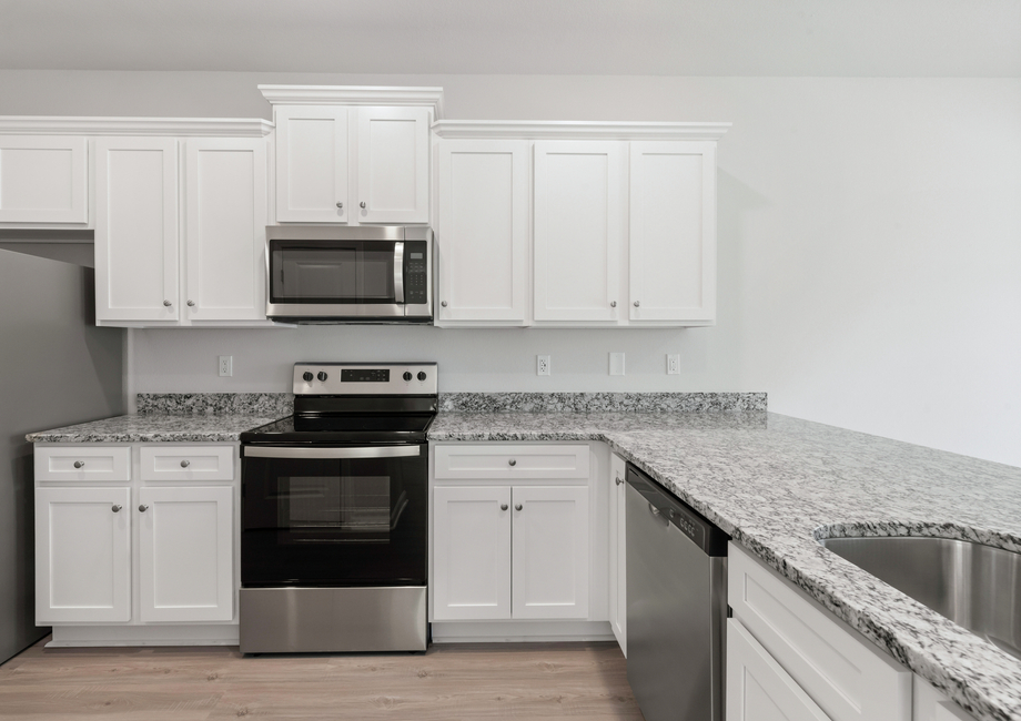 The kitchen has granite countertops