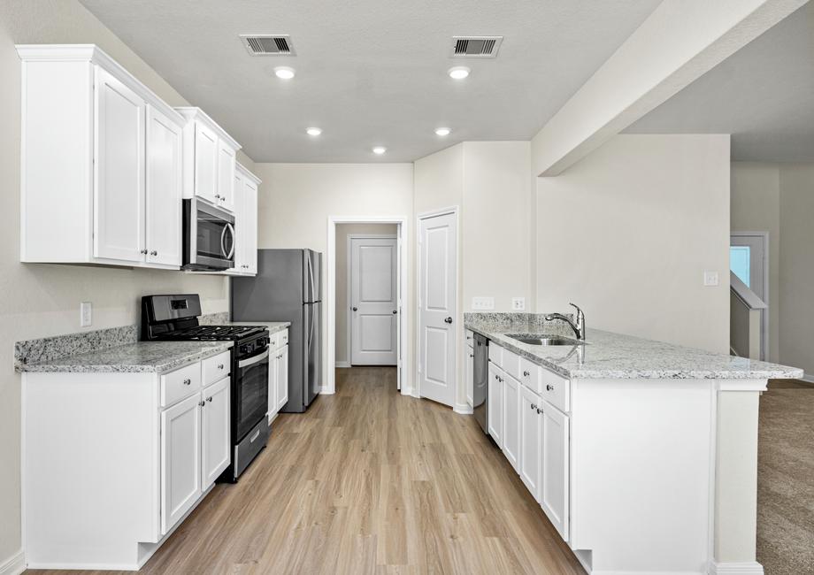 A chef-ready kitchen with a large walk-in pantry.