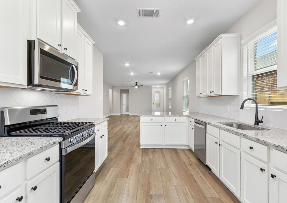 Spend time with family while cooking in this open kitchen.