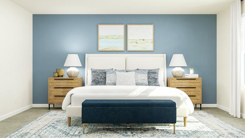 Rendering of the master bedroom in the
  Hennepin, which has a large bed centered between two nightstands. A bench
  sits at the foot of the bed and abstract artwork hangs above it.