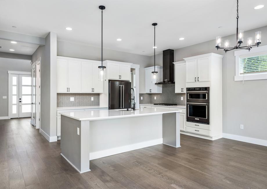 You will love being in the kitchen with an oversized island and gorgeous cabinets.