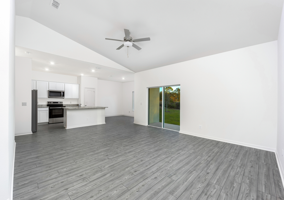 Family room with an adjoining chef-ready kitchen