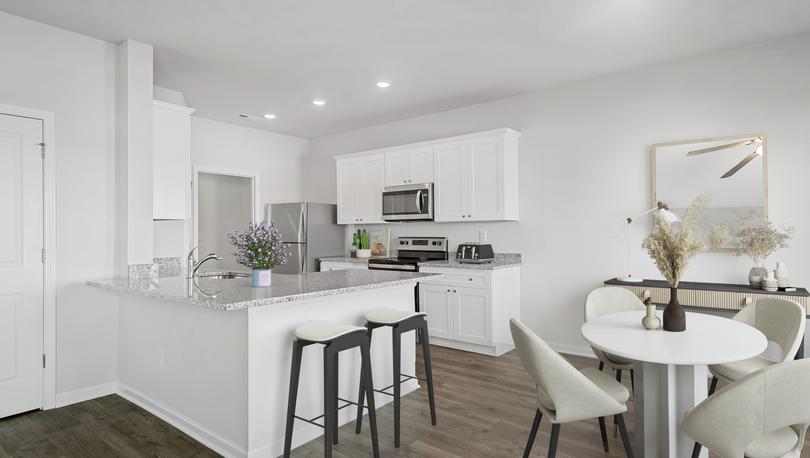 The kitchen opens in to the dining room.