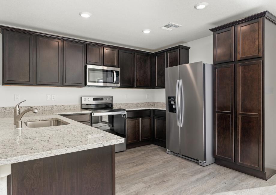 Chef-ready kitchen with granite countertops and stainless appliances.