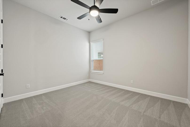 Spacious secondary bedrooms are found throughout.