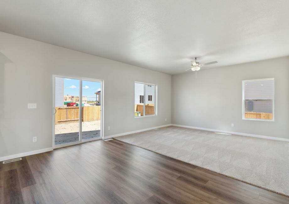 The sliding glass doors in the dining room allow for great natural light.