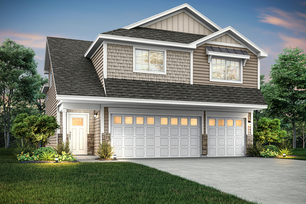 The Rachel is a beautiful two story home with siding and stone.