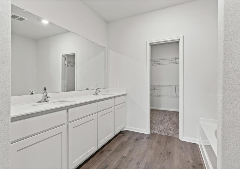 The master bathroom of the Cypress has a large vanity with dual sinks.