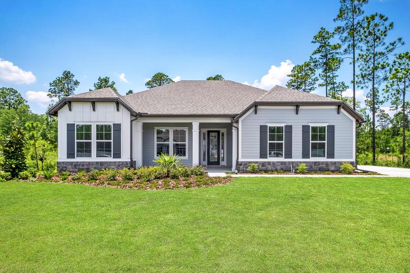The Albany has stunning curb appeal with lush front yard landscaping.