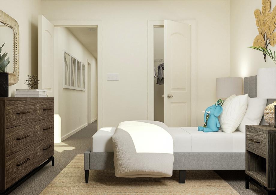 Rendering of a secondary bedroom
  featuring natural dÃ©cor, bedroom funriture and a view into the closet.