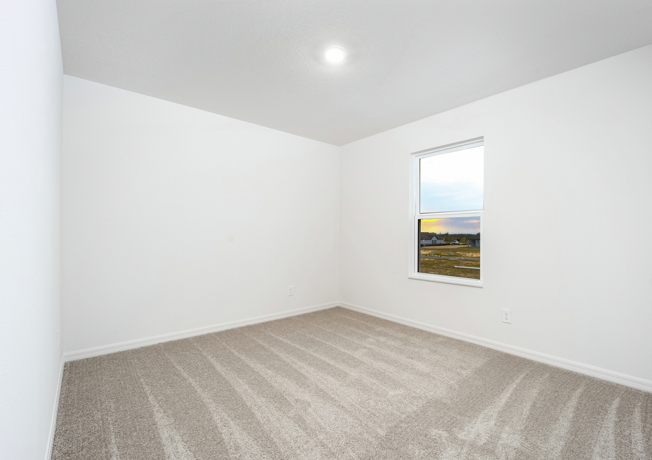 Each bedroom features its own closet and lush carpet