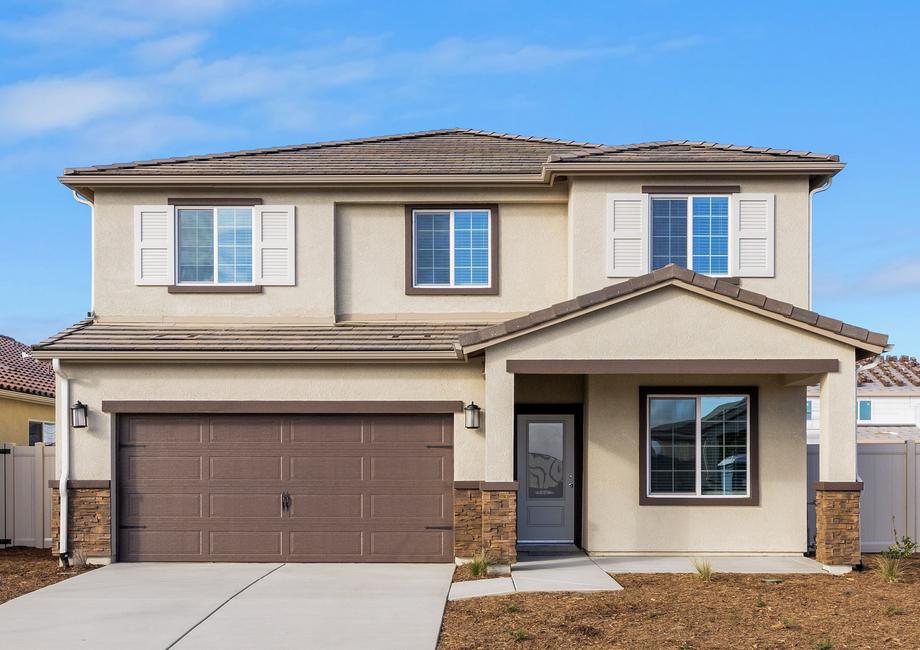 The Venice is a beautiful two story home with stucco.