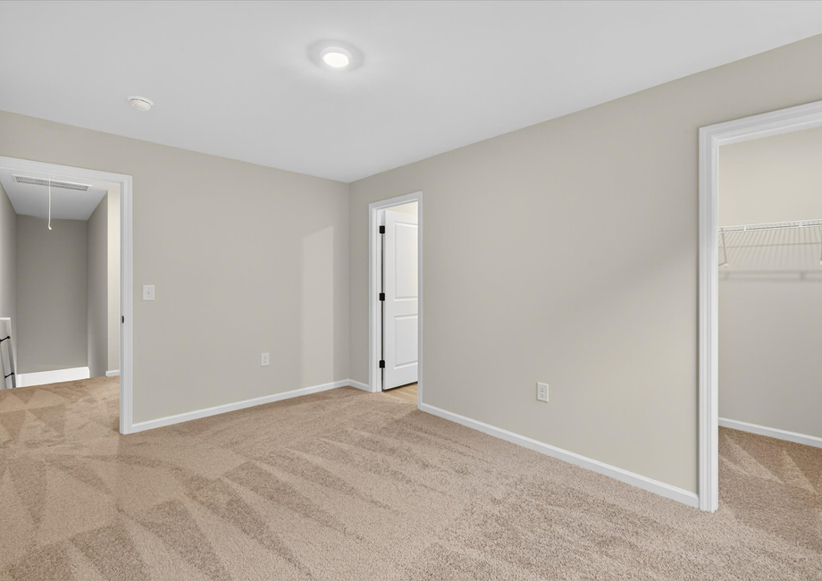 the master has an en-suite bathroom and walk-in closet. 