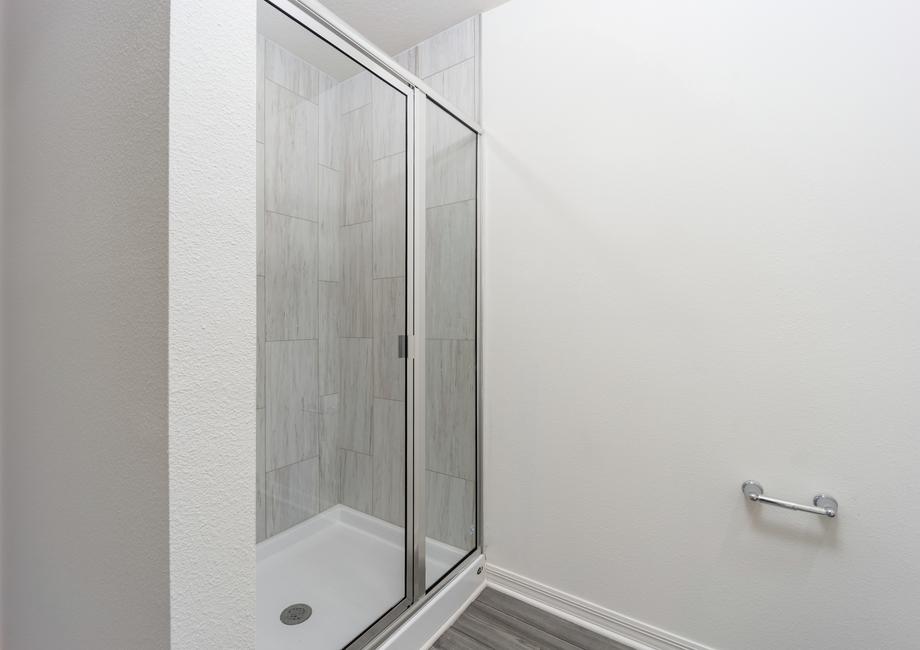 Step-in shower in the master bedroom