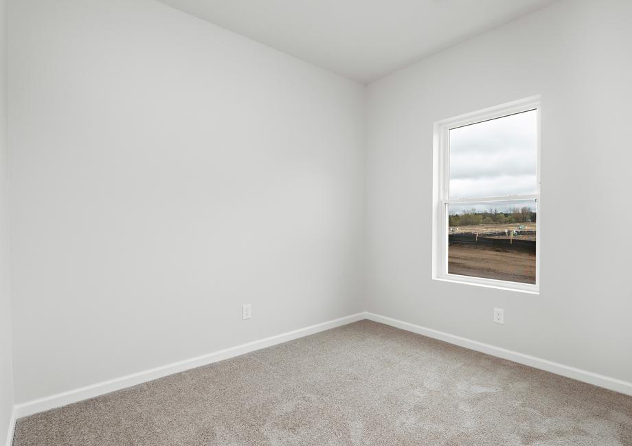 The secondary bedrooms have carpet and windows.