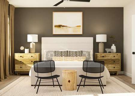 Rendering of bedroom
  highlighting two chairs in front of a large bed . 