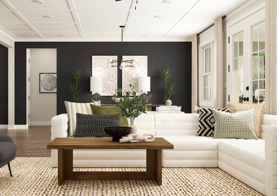 Rendering of a living room furnished with
  a larch white sectional and a side chair. This room is also furnished with a
  coffee table.