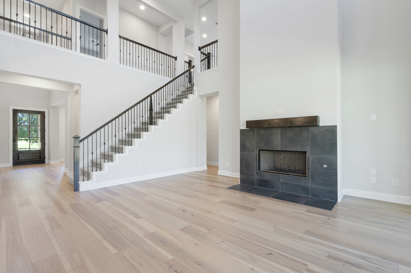 The living room has a fireplace.