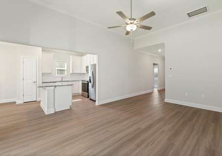 Open layout with vinyl flooring.