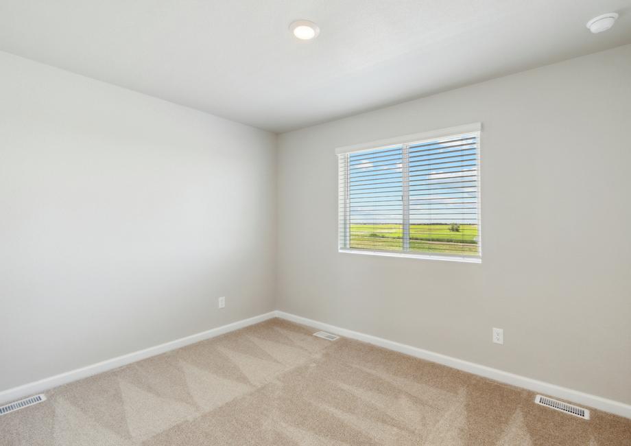 The secondary bedrooms of the Laramie are a great space for children's bedrooms or as guest rooms.