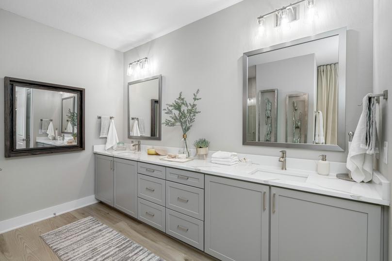 There is a sprawling vanity in the master bath.