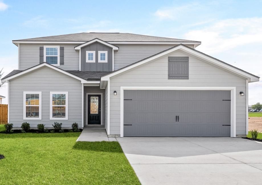 The beautiful two-story Sonora with lush front yard landscaping