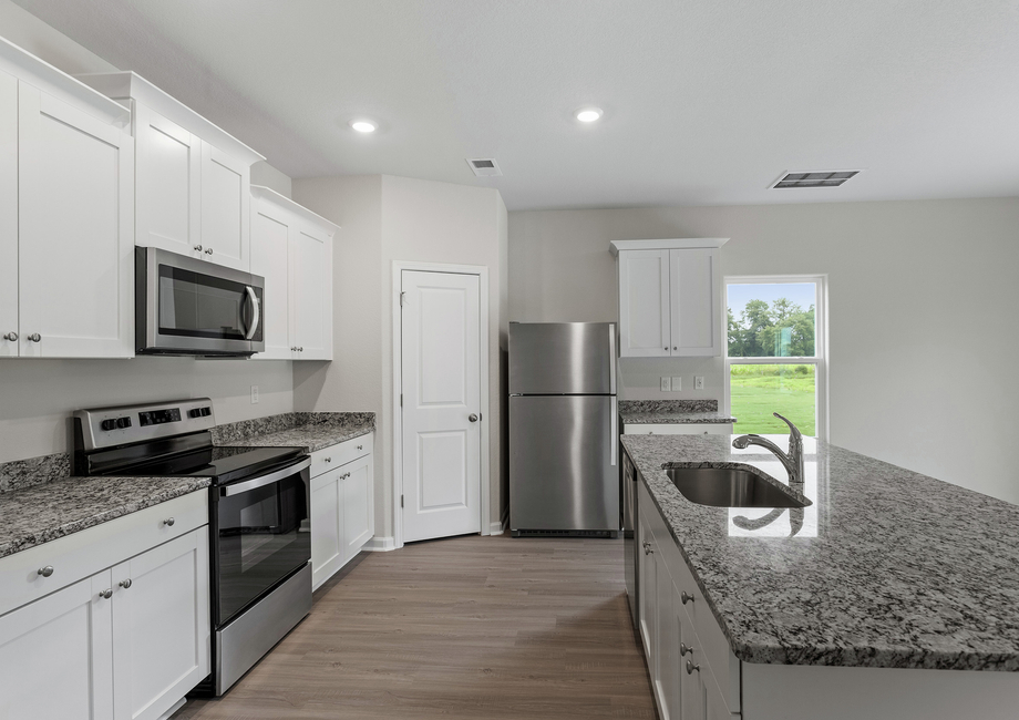 This bathroom comes with stainless-steel appliances.