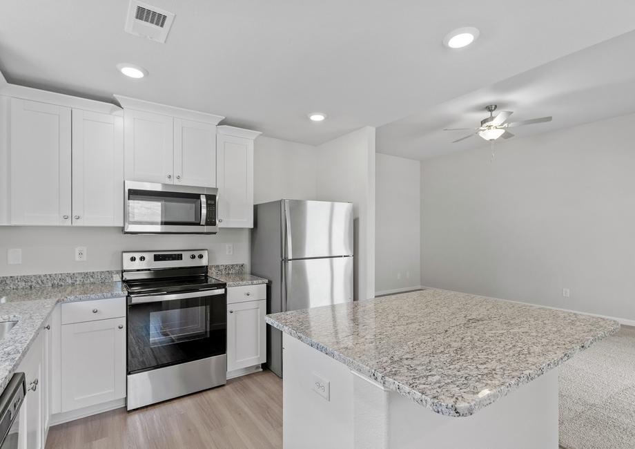 Stainless steel appliances in kitchen.