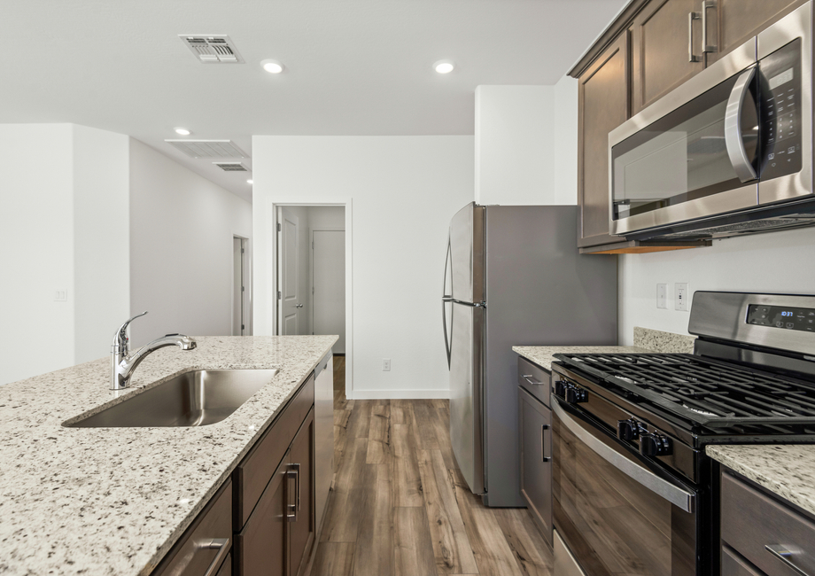 Each kitchen comes with stainless steel appliances.
